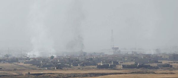 Дим у Мосулу након сукоба Пешмегри ирачких курда и терориста ДАЕШ-а, Ирак - Sputnik Србија