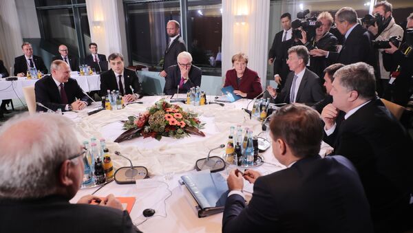 Predsednik Rusije Vladimir Putin, nemačka kancelarka Angela Merkel, ministar spoljnih poslova Nemačke Frank Valter Štajnmajer i predsednik Ukrajine Petro Porošenko tokom sastanka u Berlinu - Sputnik Srbija