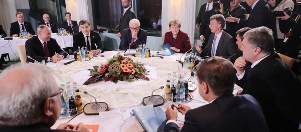 Председник Русије Владимир Путин, немачка канцеларка Ангела Меркел, министар спољних послова Немачке Франк Валтер Штајнмајер и председник Украјине Петро Порошенко током састанка у Берлину - Sputnik Србија