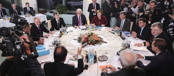 Председник Русије Владимир Путин, министар спољних послова Немачке Франк Валтер Штајнмајер, немачка канцеларка Ангела Меркел, председник Украјине Петро Порошенко и председник Француске Франсоа Оланд Председник Русије Владимир Путин, министар спољних послова Немачке Франк Валтер Штајнмајер, немачка канцеларка Ангела Меркел, председник Украјине Петро Порошенко и председник Француске Франсоа Оланд - Sputnik Србија