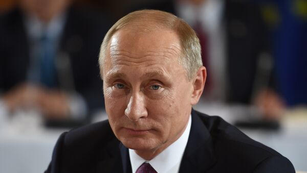 Predsednik Rusije Vladimir Putin pre početka sastanka Normandijske četvorke u Berlinu - Sputnik Srbija