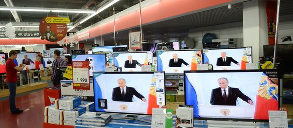 Vladimir Putin na televizijskim ekranima Vladimir Putin na televizijskim ekranima - Sputnik Srbija