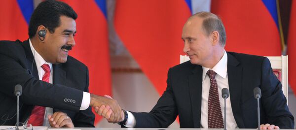 Predsednik Rusije Vladimir Putin i predsednik Venecuele Nikolas Maduro - Sputnik Srbija