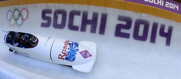Освајачи златне медаље, руски тим у бобу током такмичења на Олимпијским играма у Сочију 2014. - Sputnik Србија