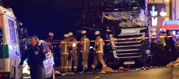 Napad na posetioce Božićnog sajma u Berlinu Napad na posetioce Božićnog sajma u Berlinu - Sputnik Srbija