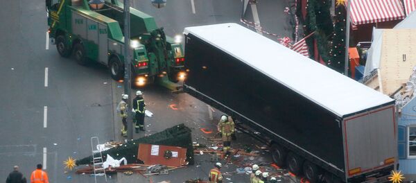 Напад на посетиоце Божићног сајма у Берлину Напад на посетиоце Божићног сајма у Берлину - Sputnik Србија