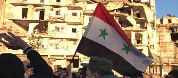 Žitelji Alepa posle izlaska terorista iz istočnog dela grada - Sputnik Srbija