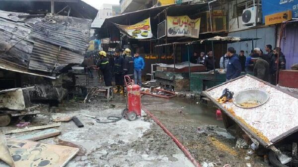 Спасиоци и ватрогасци на месту експлозије у центру Багдада - Sputnik Србија