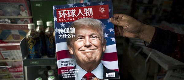 Кинески часопис са Доналдом Трампом на насловној страници Кинески часопис са Доналдом Трампом на насловној страници - Sputnik Србија