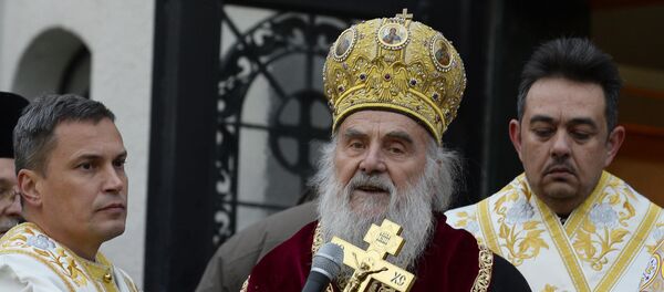 Patrijarh srpski Irinej ispred hrama Sv. Save za Badnje veče Patrijarh srpski Irinej ispred hrama Sv. Save za Badnje veče - Sputnik Srbija