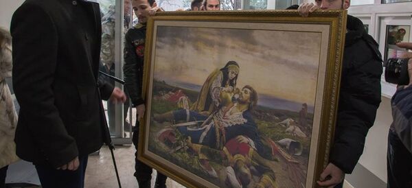 Mladi Nove srpske demokratije danas su doneli na poklon Urgentnom centru u Crnoj Gori repliku čuvene slike. - Sputnik Srbija