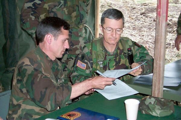 Бенц Џон Кредик у једном од кампова ОВК. Бенц Џон Кредик у једном од кампова ОВК. - Sputnik Србија