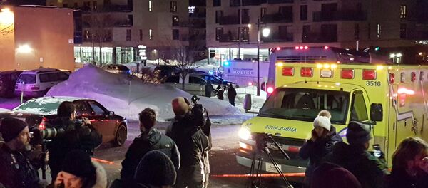 An ambulance is parked at the scene of a fatal shooting at the Quebec Islamic Cultural Centre in Quebec City, Canada January 29, 2017 - Sputnik Србија