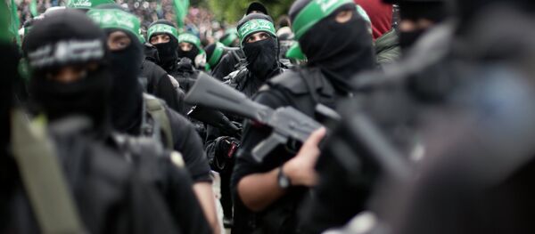 Борци Хамаса током параде поводом 27. годишњице постојања Хамаса у Појасу Газе - Sputnik Србија