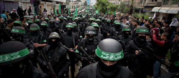 Борци Хамаса током параде поводом 27. годишњице постојања Хамаса у Појасу Газе Борци Хамаса током параде поводом 27. годишњице постојања Хамаса у Појасу Газе - Sputnik Србија