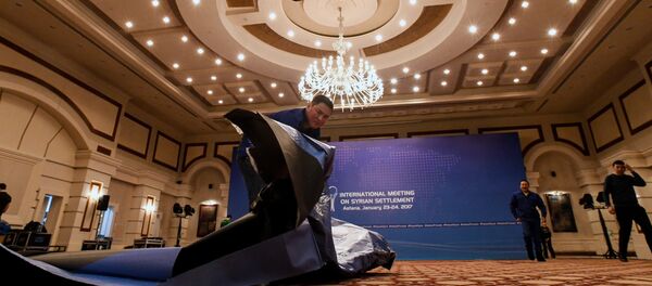 Radnici pripremaju salu za konferenciju o Siriji u Astani - Sputnik Srbija