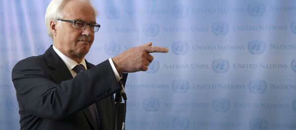 Постоянный представитель России при ООН Виталий Чуркин во время разговора с репортерами Постоянный представитель России при ООН Виталий Чуркин во время разговора с репортерами - Sputnik Србија