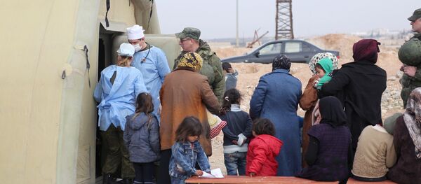 Указивање помоћи у привременом смештају за избеглице Џибрин у Алепу - Sputnik Србија