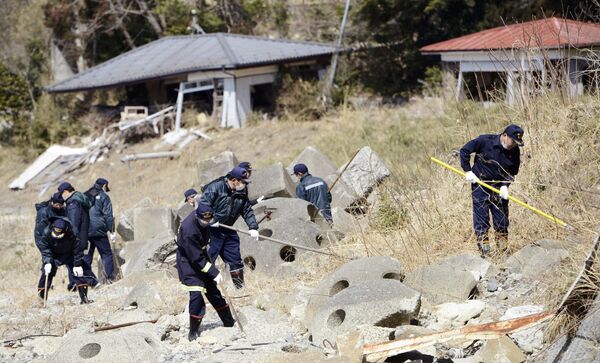 Традиционална потрага за несталима на шестогодишњицу земљотреса и нуклеарна хаварије у Фукушими - Sputnik Србија