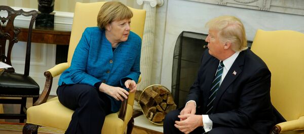 Анегла Меркел и Доналд Трамп Анегла Меркел и Доналд Трамп - Sputnik Србија