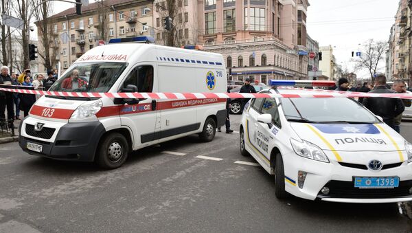 Vozila policije i hitne pomoći na mestu ubistva bivšeg poslanika Državne dume Rusije Denisa Voronjenkova u Kijevu - Sputnik Srbija