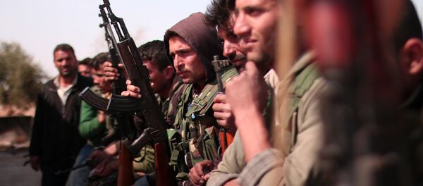 Демократске снаге Сирије у близини Раке у Сирији Демократске снаге Сирије у близини Раке у Сирији - Sputnik Србија