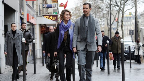 Председник Сирије Башар Асад са супругом Асмом на улици у Паризу - Sputnik Србија