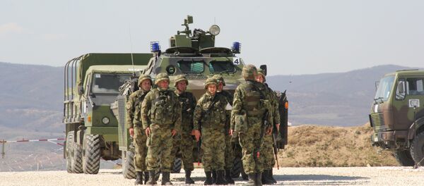 Postrojavanje brigade posle uspešno završene vežbe. - Sputnik Srbija