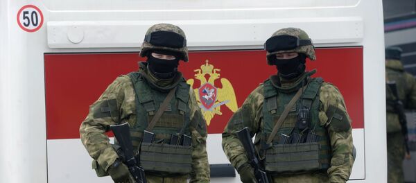 Припадници руске националне гарде на вежби - Sputnik Србија