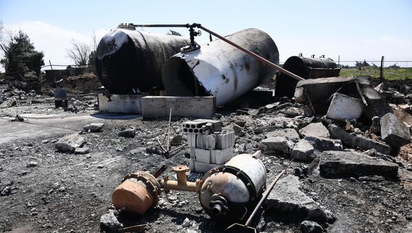 Последице Америчког бомбардовања сиријског аеродрома код Хомса - Sputnik Србија