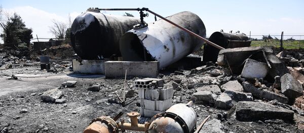 Последице Америчког бомбардовања сиријског аеродрома код Хомса Последице Америчког бомбардовања сиријског аеродрома код Хомса - Sputnik Србија