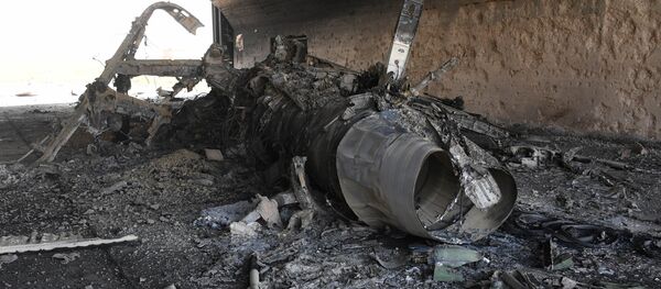 Авион који је уништен у ракетном нападу САД на војну базу у Сирији - Sputnik Србија