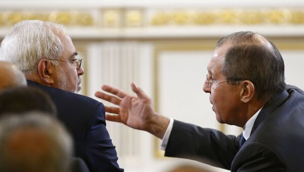 Ministar spoljnih poslova Rusije Sergej Lavrov tokom sastanka sa iranskim kolegom Džavadom Zarifom - Sputnik Srbija