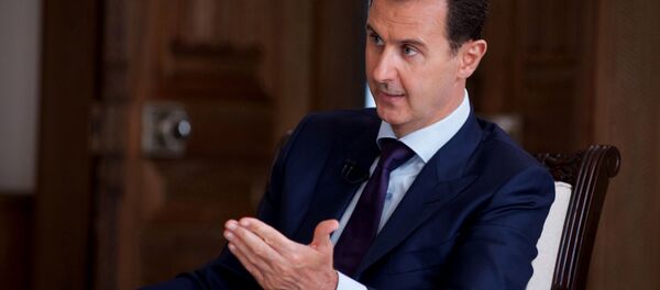 In this photo released on July 1, 2016, by the Syrian official news agency SANA, Syrian President Bashar Assad speaks during an interview with Australia's SBS news channel, in Damascus, Syria - Sputnik Србија