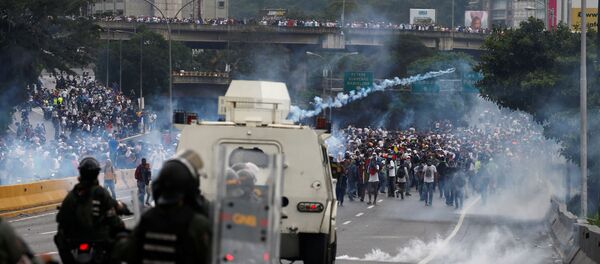 Протести против председника Николаса Мадура у Каракасу Протести против председника Николаса Мадура у Каракасу - Sputnik Србија