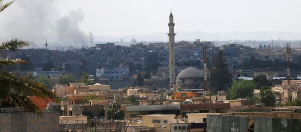 Дим изнад старог дела Мосула током борбе ирачких снага против ДАЕШ-а - Sputnik Србија