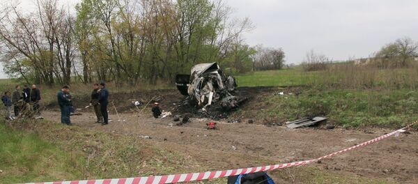 Mesto eksplozije vozila specijalne posmatračke misije OEBS-a u Luganskoj oblasti - Sputnik Srbija