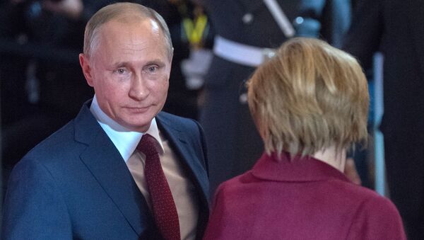Predsednik Rusije Vladimir Putin i kancelarka Nemačke Angela Merkel u Berlinu - Sputnik Srbija