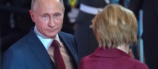 Predsednik Rusije Vladimir Putin i kancelarka Nemačke Angela Merkel u Berlinu - Sputnik Srbija