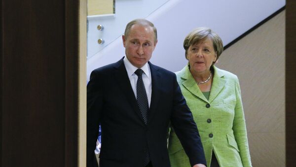 Vladimir Putin i Angela Merkel - Sputnik Srbija