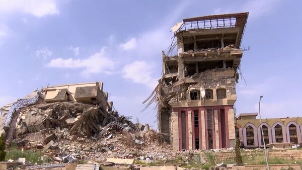 Ruševine biblioteke u Mosulu - Sputnik Srbija