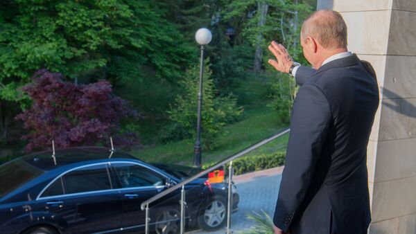 Predsednik Rusije Vladimir Putin i kancelarka Nemačke Angela Merkel u Sočiju - Sputnik Srbija