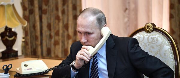 Председник Русије Владимир Путин током телефонског разговора са председником Таџикистана Емомалијем Рахмоном - Sputnik Србија