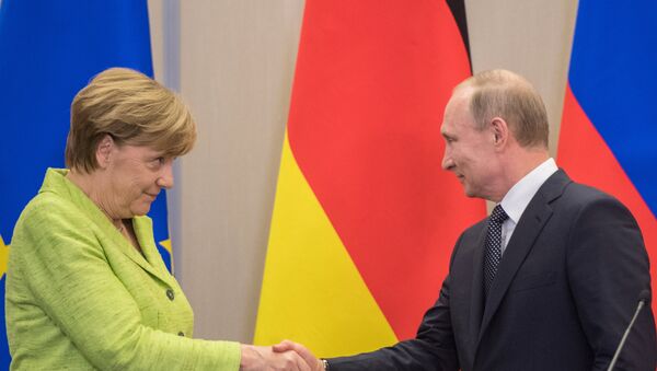 Председник Русије Владимир Путин и немачка канцеларка Ангела Меркел у Сочију - Sputnik Србија