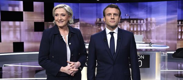 Kandidati za predsednika Francuske Marin le Pen i Emanuel Makron - Sputnik Srbija