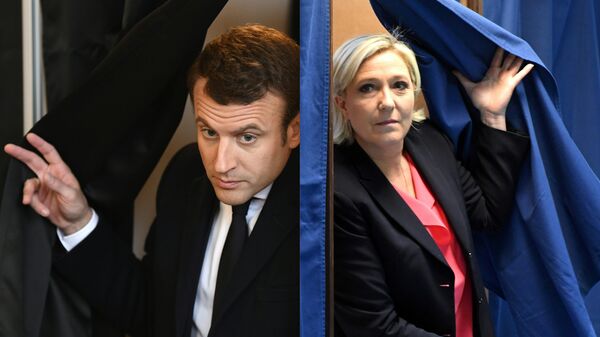 Marin Le Pen i Emanuel Makron na glasanju u Parizu  - Sputnik Srbija