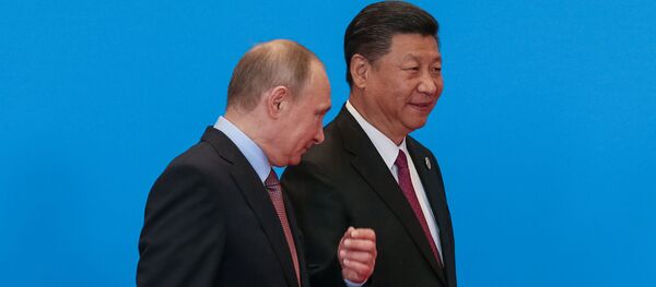 Kineski predsednik Si Đinping i predsednik Rusije Vladimir Putin na Forumu Jedan pojas - jedan put u Pekingu Kineski predsednik Si Đinping i predsednik Rusije Vladimir Putin na Forumu Jedan pojas - jedan put u Pekingu - Sputnik Srbija