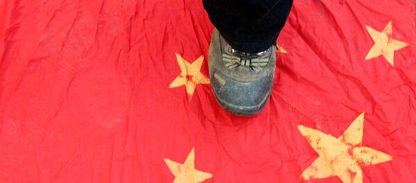 Нога на кинеској застави - Sputnik Србија