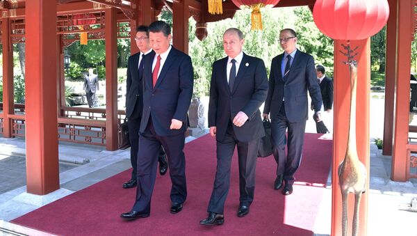 Predsednici Rusije i Kine Vladimir Putin i Si Đinping na forumu u Pekingu - Sputnik Srbija