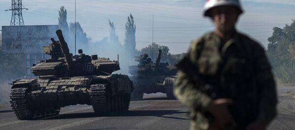 Повлачење тешког наоружања са линије додира у самопроглашеној Луганској Народној Републици - Sputnik Србија